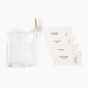 Elegant 350ml clear glass olive oil dispenser bottle with gold pourer and labels set