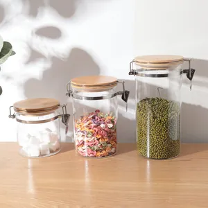 Set of three airtight borosilicate glass jars with bamboo lids and metal buckles