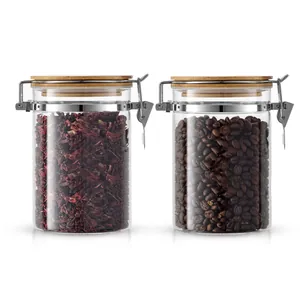 Set of two airtight glass storage jars with bamboo lids for coffee beans and tea