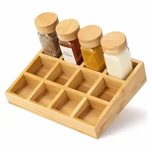 Close-up view of bamboo spice jar set featuring 120ml square glass bottles on base
