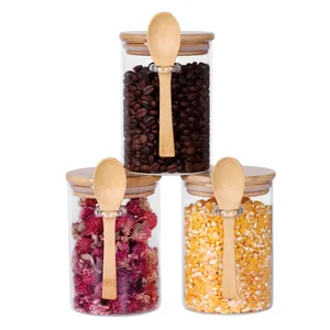 Set aus drei 500-ml-Glasvorratsgläsern mit Bambusdeckeln und passenden Holzlöffeln.