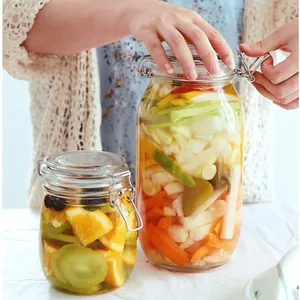 Detail of airtight glass pickling jars filled with colorful vegetables and fruits