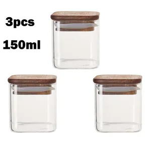 Set of 3 square glass storage jars with natural acacia wood lids, 150ml capacity
