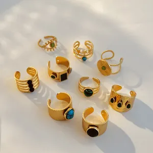Collection of vintage 18K gold plated stainless steel open rings with natural stones