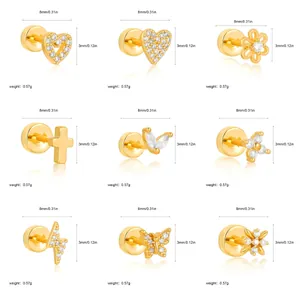 Detailed view of 18K gold plated stainless steel stud earrings in heart and cross shapes