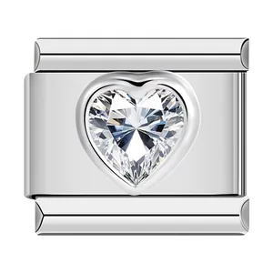 Detailed view of stainless steel modular link featuring a heart-shaped faceted crystal
