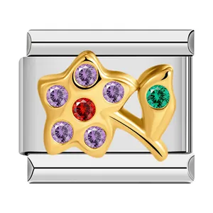 Detail macro view of stainless steel flower charm with colorful cubic zirconia stones