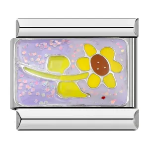 Detailed close-up of a sunflower enamel Italian modular bracelet link in stainless steel