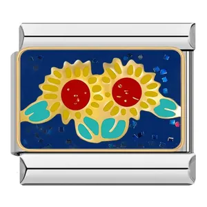 Detail view of a sunflower pattern enamel Italian charm link for modular bracelets.