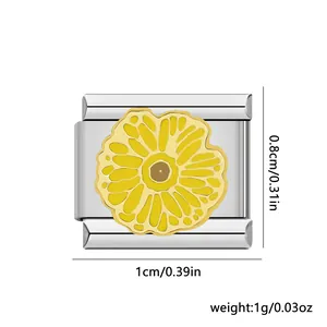 Detail of stainless steel Italian modular charm featuring a yellow sunflower design.