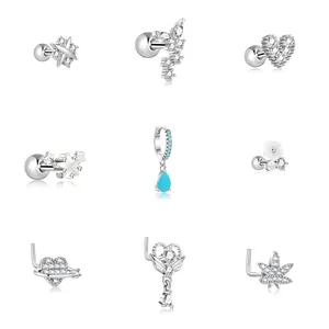 Set of 9 stainless steel piercing studs with sparkling cubic zirconia and heart designs