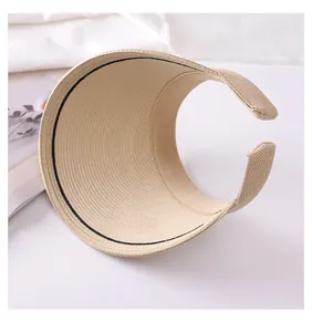 Macro view of the high-quality woven texture on beige straw sun visor headband