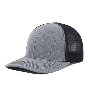Detailed side view of two-tone grey and black mesh back trucker style baseball cap