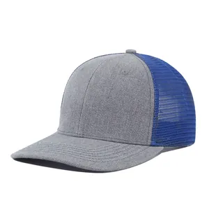 Detailed side view of a two-tone trucker cap with grey fabric and blue mesh back