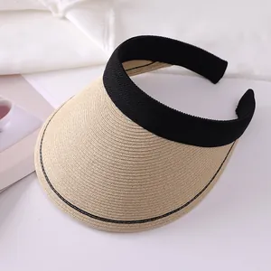 Elegant woven straw sun visor hat with black fabric trim for effective summer UV protection