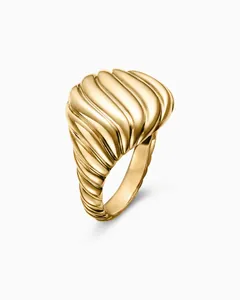 Detailed view of the 18K gold plated croissant dome ring with a rippled texture finish