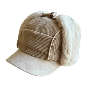 Vintage khaki corduroy trapper hat with thick plush faux fur ear flaps for outdoor winter warmth