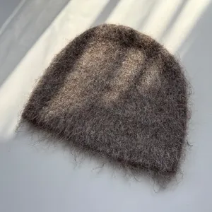 Soft fluffy mohair beanie hat in grey for winter warmth and cozy style