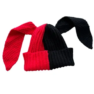 Contrast split red and black knitted beanie featuring long rabbit ears for winter