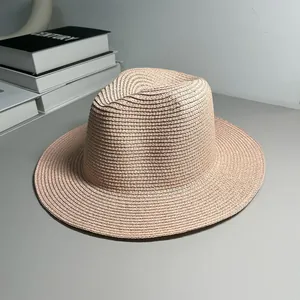 Detailed macro shot showing the fine texture of a woven Panama straw jazz fedora hat