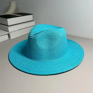 Vibrant turquoise woven Panama straw hat for beach sun protection and summer style