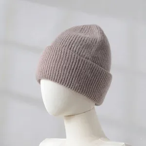 Close-up detail of a soft rabbit hair blend knit beanie featuring a warm ribbed texture