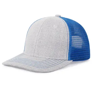 Detailed close-up of a grey and blue trucker hat featuring breathable mesh and a curved brim