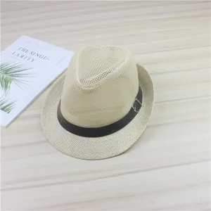 Close-up of beige woven mesh fedora hat with black band and metal buckle