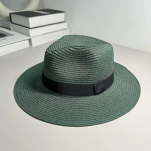 Stylish dark green straw fedora hat with black ribbon, perfect for summer beach sunshade