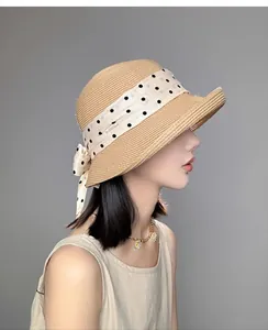 Elegante cappello di paglia stile francese con nastro a pois e fiocco per vacanze estive