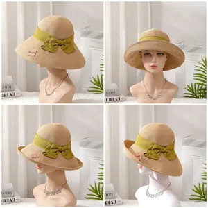 Women's wide-brim straw hat showing four versatile wearing styles for summer sun protection