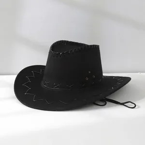 Close-up view of a classic black western cowboy hat with intricate decorative stitching
