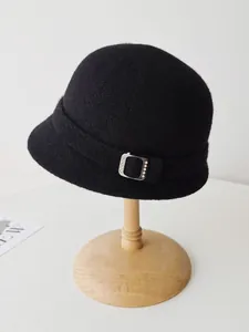 Elegant French style black wool felt cloche hat featuring a rhinestone buckle detail