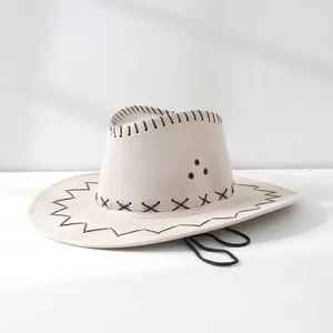Detailed view of a beige western cowboy hat with black decorative lacing on the brim
