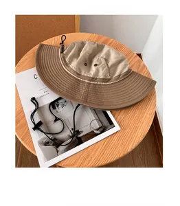 Close-up detail of a breathable wide brim sun hat for outdoor sports activities