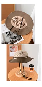 Detailed view of a two-tone breathable outdoor sun hat with an adjustable drawstring