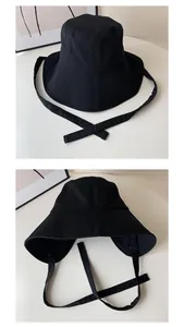 Detailansichten eines schwarzen Sonnenhutes mit verstellbarem Kinnriemen für Damen.