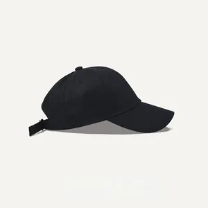 Side view of a classic black washed cotton baseball cap with an adjustable back strap