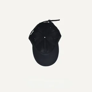 Detailed interior view of a black washed cotton baseball cap with adjustable strap.