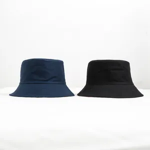 Σύγκριση μπλε και μαύρων καπέλων bucket διπλής όψης για προστασία από τον ήλιο