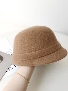Detailed view of elegant camel wool cloche hat for women in vintage French style