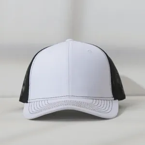 Detailed front view of a white and black mesh trucker hat with contrast stitching