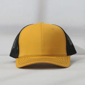 Detailed front view of two-tone yellow and black mesh trucker hat with stitched brim