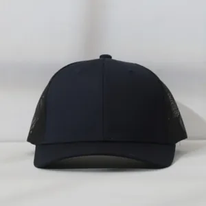 Close-up of black mesh trucker hat with breathable side panels and curved brim