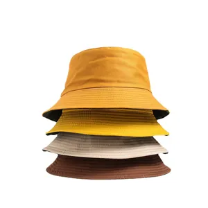 Μονόχρωμα καπέλα bucket διπλής όψης για καλοκαιρινή αντηλιακή προστασία σε στοίβα
