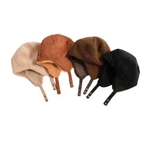 Reversible winter lambswool trapper hat with corduroy fabric and warm ear flaps