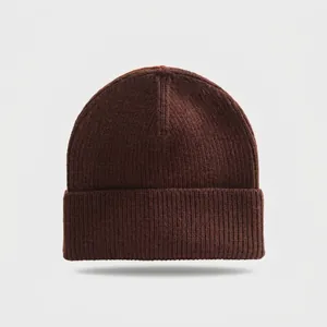 Close-up view of a dark brown ribbed knit beanie hat with a classic cuffed design