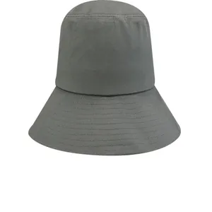 Detailed macro view of a grey wide-brimmed bucket hat showing durable cotton fabric texture