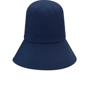 Detail of a navy blue wide-brim bucket hat with sun protection for large head sizes.
