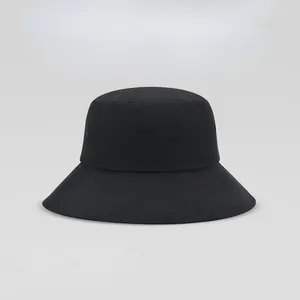 Classic plain black cotton bucket hat with wide brim for sun protection and outdoor style